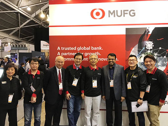 Senior executives from MUFG and Ravi Menon, Managing Director of Monetary Authority of Singapore (third from right) at the Singapore FinTech Festival.