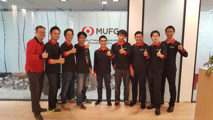 Our Asian Systems Office team giving the thumbs-up after hosting more than 120 visitors to the MUFG innovation centre at the Singapore FinTech Festival.