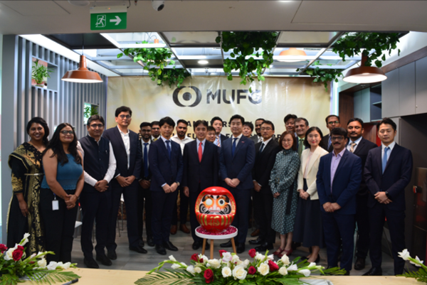 Management and staff celebrating GIFT City branch’s first anniversary